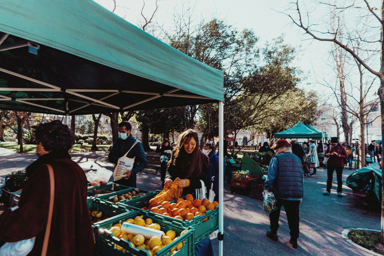 Residents at an outdoor community market